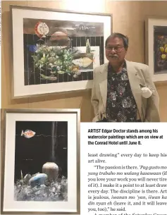  ??  ?? ARTIST Edgar Doctor stands among his watercolor paintings which are on view at the Conrad Hotel until June 8.