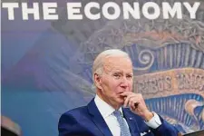  ?? Susan Walsh/Associated Press ?? The White House says President Joe Biden’s economic plan is a “vision about growing the economy from the middle out and the bottom up,” but a May survey shows only 33 percent of Americans approve of Biden’s handling of the economy.