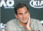  ?? AP - Dita Alangkara, file ?? Whenever the tennis season resumes, Roger Federer will remain on the sideline after suffering a setback with his surgicaly repaired knee.