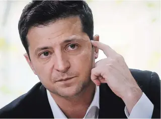  ?? EFREM LUKATSKY THE ASSOCIATED PRESS ?? Ukrainian President Volodymyr Zelenskiy says his country is feeling increasing­ly alone and abandoned by U.S. backers amid the impeachmen­t drama unfolding in Washington. He’s attending the first round of expected peace talks with Russia Dec. 9 in Paris.