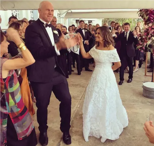  ?? Picture: Sylvia Jeffreys ?? WEDDED BLISS: Lisa Wilkinson and Peter FitzSimons renew their vows in Sydney.