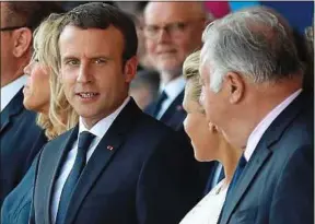  ??  ?? Emmanuel Macron et le président du Sénat, Gérard Larcher, le 14 juillet.