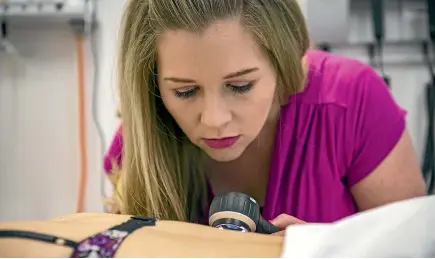  ?? PHOTOS: DAVID WALKER/STUFF ?? Dermatolog­ist Victoria Scott-Lang was one of eight CDHB dermatolog­ists to volunteer their time for the free skin check day at the Canterbury Charity Hospital on Saturday.