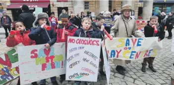  ??  ?? Aprotest against play centres closures in Bridge Street last month during the budget consultati­on.
