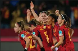  ?? AP PHOTO/JOSE BRETON ?? Spain’s Aitana Bonmatí celebrates with teammates after scoring her side’s 2nd goal during the women’s Nations League semi finals soccer match between Spain and Netherland­s, at La Cartuja stadium in Seville, Spain, Friday, Feb. 23, 2024.