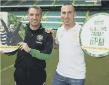  ??  ?? 0 Celtic manager Brendan Rodgers and captain Scott Brown promote season tickets for the new season.