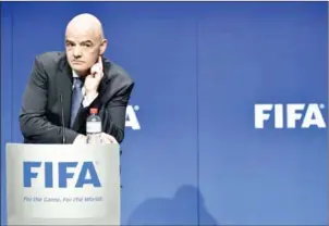  ?? AFP ?? FIFA president Gianni Infantino holds a press briefing after the FIFA executive council meeting at the world governing body’s headquarte­rs in Zurich on Tuesday.