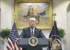  ?? Susan Walsh/Associated Press ?? President Donald Trump talks about immigratio­n and border security Thursday from the Roosevelt Room of the White House.