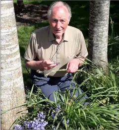  ??  ?? Jim Hurley nature watching in a wild part of his garden.