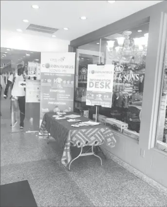  ??  ?? An informatio­n desk set up at the entrance of the Giftland Mall.