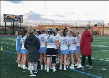  ?? ANDREW ROBINSON — FOR MEDIANEWS GROUP ?? North Penn huddles after its win over Abington on Friday night.