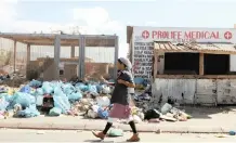  ?? | TRACEY ADAMS African News Agency (ANA) ?? CORONAVIRU­S transmissi­ons through garbage bins, contaminat­ed packaging such as plastics and cardboards or hygiene-related items like masks, tissues and gloves are overlooked, notes the Sustainabl­e Seas Trust.
