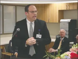  ?? The Sentinel-Record/Richard Rasmussen ?? HOSPITAL PRESIDENT CHI St. Vincent Hot Springs President Dr. Doug Ross speaks as Gov. Asa Hutchinson listens during the grand opening for the CHI St. Vincent Hot Springs Anthony Childbirth Center on Monday.