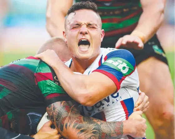  ?? Picture: GETTY IMAGES ?? Jaelen Feeney could be feeling the pain again when the Titans target the young half and his running mate Brock Lamb today.