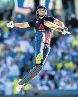  ?? /Reuters ?? Leap of joy: England’s Jos Buttler celebrates his 100 off 83 balls against Australia on Sunday.