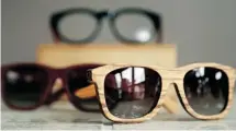  ??  ?? Bôhten wooden glasses are made from reclaimed wood in Africa. Some styles also include acetate fronts and range in price from $180 to $240.