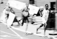  ?? FRANK GUNN THE CANADIAN PRESS ?? Marco Arop runs from the field to win the men’s 800-metre race Sunday.