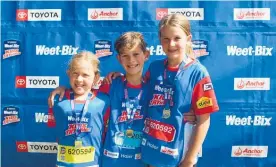  ?? ?? Cooper George, 9, and his sisters Maggie, 8, and Molly,11, completed the New Plymouth Weet-Bix Kids Tryathlon on Wednesday.