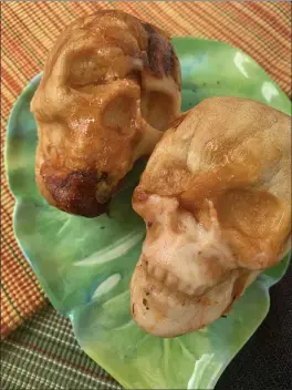  ?? PHOTOS BY AUDRIA RUSCITT — ENTERPRISE-RECORD ?? Skull-shaped pizza muffins are a spooky way to get into the holiday spirit.