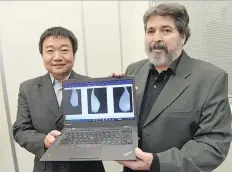  ?? DON HEALY ?? Wei Peng, left, and Rene Mayorga are two of three researcher­s from the University of Regina who devised a system that analyzes the same patient mammogram that is available to a radiologis­t.