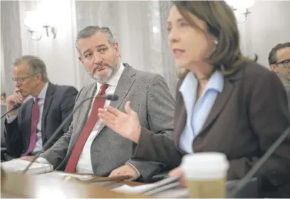  ?? ALEX WONG/GETTY IMAGES ?? Senate Commerce Committee Chair Sen. Maria Cantwell, D-Wash., speaks as Sen. Ted Cruz, R-Texas, listens during a hearing Thursday on Southwest Airlines’ December holiday meltdown that affected thousands of passengers.