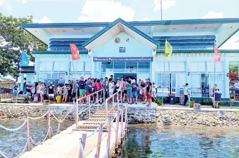  ??  ?? THE Marine Protection and Informatio­n Center also serves as a museum and port for Sugba