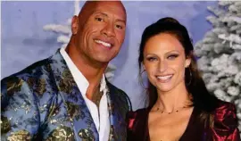  ?? AFP ?? Dwayne Johnson y su esposa Lauren la vieron fea. Él insiste en cuidarse.