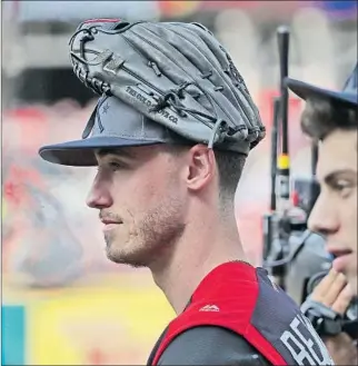  ?? Tannen Maury EPA/Shuttersto­ck ?? CODY BELLINGER, shown at All-Star practice Monday, became a platoon player last year because of his woes against left-handers. A focus on mechanics has helped him transform his game.