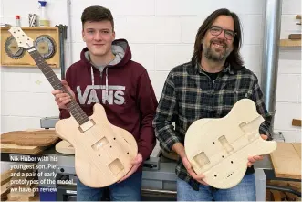  ??  ?? Nik Huber with his youngest son, Piet, and a pair of early prototypes of the model we have on review