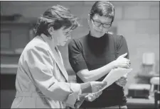  ?? GRAHAM HUGHES/ THE GAZETTE ?? Director Emma Tibaldo, right, goes over lines with Jennifer Morehouse during a rehearsal for Talisman Theatre’s production of The Medea Effect. Talisman specialize­s in English translatio­ns of French-language works.