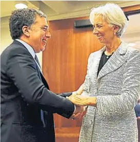  ?? (AP / ARCHIVO) ?? Fondo. Dujovne y Lagarde mantuviero­n un encuentro la semana pasada en los Estados Unidos.