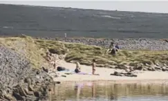  ??  ?? BEAUTY SPOT: Gaddings Dam, Lumbutts, above Todmorden, is dubbed the UK’s highest beach and attracts crowds in warm weather