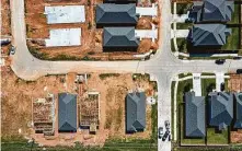  ?? Mark Mulligan / Staff photograph­er ?? New homes in the Katy Pointe neighborho­od have added to the rapid growth of registered voters in Harris County.