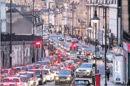  ??  ?? Under the Clean Air Zone proposals motorists could be charged £9 per day to drive older vehicles into the centre of Bath and non-compliant HGVS, coaches and buses would pay £100
