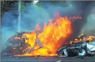  ?? MATICHON TV VIA AP ?? Two vehicles burn after they collided on a highway east of Bangkok, Thailand, on Monday.