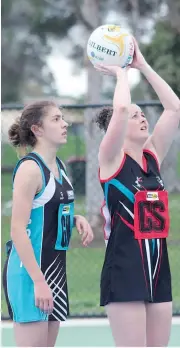  ??  ?? Warragul A grade goal shooter Jaime Rollinson was amongst the award winners for her game against Wonthaggi Power’s goal keeper Annabelle Williams. Wonthaggi won 58-53.