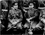  ?? ?? Nicholas II (left) pictured with Russian officers, c.1916. His disastrous leadership as commander-in-chief of the military in WWI led to the collapse of tsarism and bloody revolution