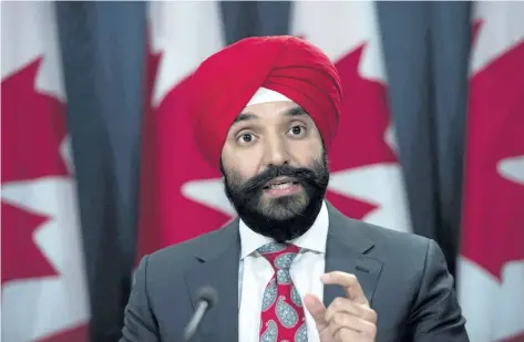  ?? THE CANADIAN PRESS FILES ?? Economic Developmen­t Minister Navdeep Bains will announce the winners Thursday of a competitio­n to form technology “superclust­ers” — a prize that will guarantee the chosen groups a piece of up to $ 950 million in funding.