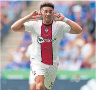  ?? ?? Che Adams is all ears after scoring his second