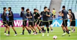  ?? — AFP ?? SOCHI: Mexico’s players take part in a training session at the Fisht stadium in Sochi yesterday on the eve of the 2017 FIFA Confederat­ions Cup football match between Mexico and New Zealand.