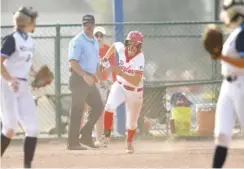  ?? STAFF PHOTO BY ROBIN RUDD ?? Baylor’s Holly Merritt runs toward second base for a double during the Lady Red Raiders’ victory against Chattanoog­a Christian to win the TSSAA Division II-AA softball state title on May 25, 2023, in Murfreesbo­ro.