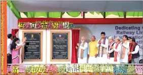  ?? IANS ?? Prime Minister Narendra Modi unveils the plaque to inaugurate the Garjee-belonia railway line in Agartala on Saturday.