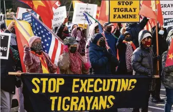  ?? Alex Brandon / Associated Press ?? Tigrayans protest near the State Department in Washington D.C. Ethiopia has detained and disappeare­d thousands of Tigrayans deported from Saudi Arabia, Human Rights Watch says.