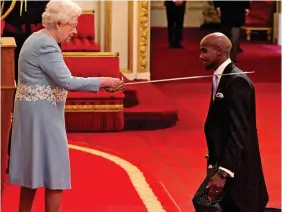  ?? ?? Honoured: The Olympian is knighted by Queen Elizabeth in 2017