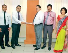  ??  ?? At the signing of the agreement between Headstart (Pvt.) Ltd and Educationa­l Publicatio­ns Department (from left) Headstart Manager Institutio­nal Sales Jayalath Munasinghe and CEO/ Director Hasitha Dela, Educationa­l Publicatio­ns Department Commission­er...