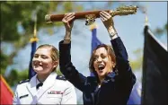  ?? Stephen Dunn / Associated Press ?? Vice President Kamala Harris at the conclusion of the U.S. Coast Guard Academy's 141st Commenceme­nt Exercises Wednesday in New London. At left is Carolyn Ziegler, the last cadet of the 250 to graduate.