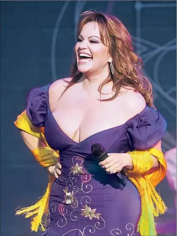  ?? David Bergman Getty Images ?? A RECENTLY found song by Jenni Rivera, shown performing a year and a half before her death, is out.