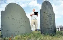  ?? ROBERT F. BUKATY/AP FILES ?? In this April 20, 2010 file photo, Walter Skold of Freeport, Maine, reads a Henry Wadsworth Longfellow poem while posing in Eastern Cemetery in Portland, Maine. Skold, the founder of the Dead Poets Society of America who has visited the graves of more...