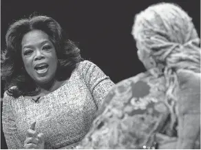  ?? FRANK POLICH/GETTY IMAGES ?? Oprah Winfrey talks with Toni Morrison at an awards dinner in 2010.