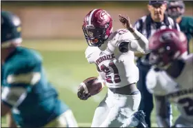  ?? NWA Democrat-Gazette/BEN GOFF @NWABENGOFF ?? Ladarius Wonsley, Springdale High wide receiver, runs after a catch in the third quarter against Alma on Friday at Airedale Stadium in Alma.